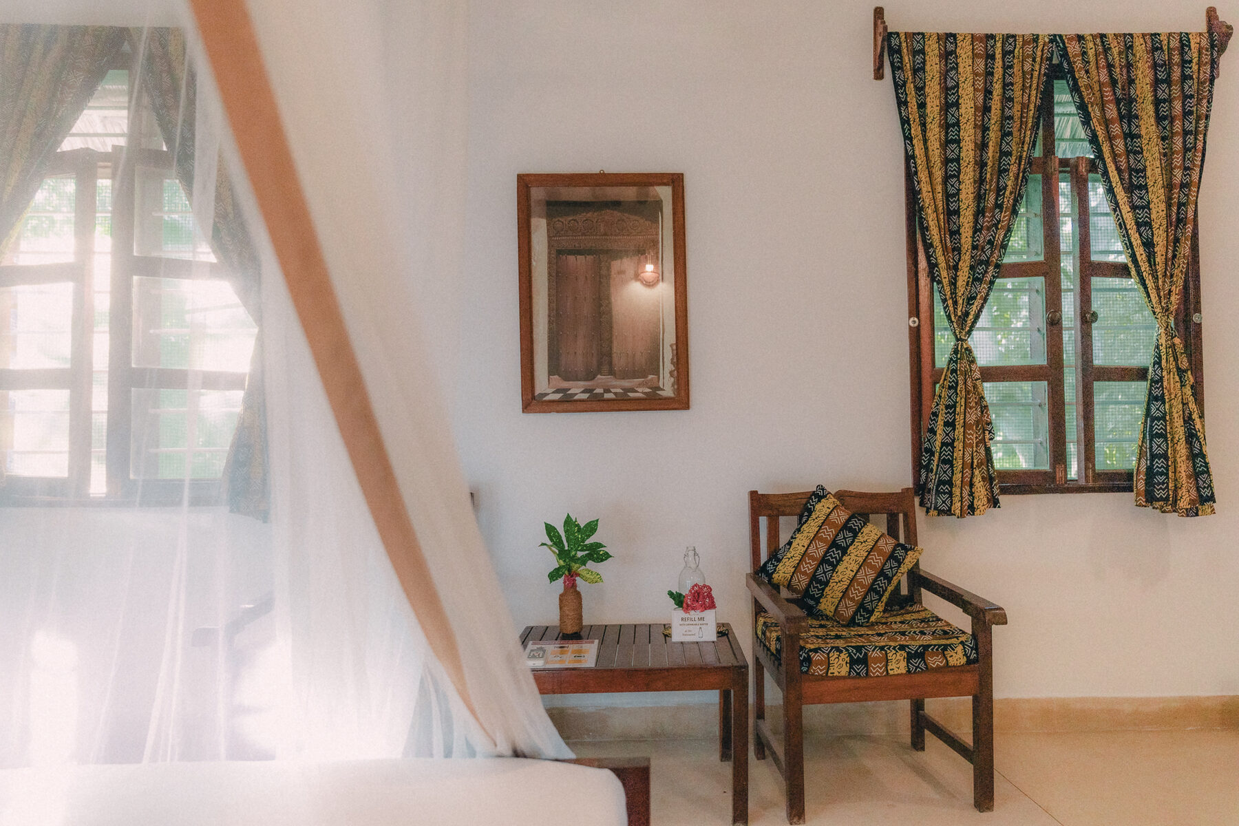 Light-filled guest room at Mangrove Lodge